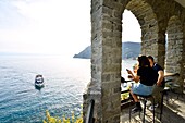 Italy, Liguria, La Spezia province, Cinque Terre National Park, listed as World Heritage by UNESCO, Monterosso al Mare village, Aurora tower from 16th century, Torre Aurora restaurant bar