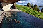 Chile, Los Lagos region, Chiloé Island, Castro District, Rilan Peninsula, San José Municipality, Tierra Chiloé hotel, the infinity pool