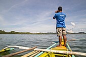 Philippines, Palawan, Malampaya Sound Protected Landscape and Seascape, natural guide looking for the elusive and critically endangered Irrawaddy Dolphin (Orcaella brevirostris - Malampaya Sound subpopulation)