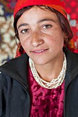 Tajikistan, Gorno-Badakhshan Autonomous Region, Langar, portrait of a Tajik girl wearing a headscarf