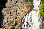 Canada, Quebec province, Beaupre, Sainte Anne Canyon dug by the Saint Anne du Nord River, and with a 74m high waterfall, climbing