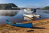 Canada, Province of Quebec, Mauricie Region, Hydravion Aventure, Saint-Maurice Wildlife Sanctuary North of La Mauricie National Park, Early morning canoe trip on Soucis Lake MODEL RELEASE OK