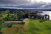 Chile, Los Lagos region, Chiloé Island, Castro District, Rilan Peninsula, San José Municipality, Tierra Chiloé hotel (aerial view)