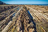 Spain, Basque Country, Guipuzcoa, Zumaia, UNESCO Flysch Geopark, or Basque coastal flat, with stratotypes dating back millions of years