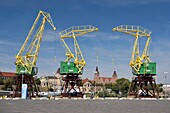 Poland, Western Pomerania, Smolecin (Szczecin), Oder tourist area called Old Town Shore (Nabrzeze Starówka), old port cranes become historical monuments