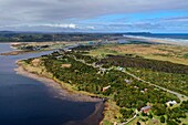 Chile, Los Lagos region, Chiloé Island, Cucao, Chiloe National Park on the West Coast, lake Huillinco and the Pacific Ocean in the background (aerial view)