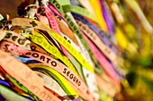 Brazil, state of Bahia, Arraial d'Ajuda, bracelets expressing wishes in front of Matriz Nossa Senhora D'Ajuda church