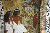 Egypt, Upper Egypt, Nile Valley, Valley of Craftsmen, turbaned temple guard and djellaba in the tomb adorned with polychrome paintings by the chief craftsmen Sen Negem