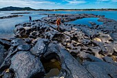 Colombia, Vichada, Puerto Carreno, Ventana Reserve on the Orenoco river, walk on the submerged rocks and swim in water holes