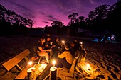 Ecuador, Tena, immersion life experience with the Waoranis, bivouac on Rio Nushino's shores, candlelight dinner on the beach