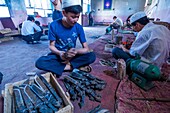 China, Xinjiang autonomous region, Yengisar, workshops producing traditional Uighur daggers and knives, handles making