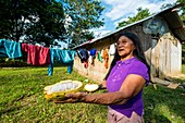 Ecuador, Tena, immersion life experience with the Waoranis of the Rio Nushino, Dayuno community, fresh cocoa pods with beans