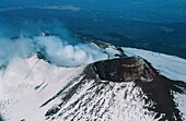 Italy, Sicily, Near Catania, Craters summit Etna volcano seen from the sky (aerial view)