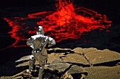 Ethiopia, Danakil Desert, Volcanologists conduct lava sampling in Erta Alé volcano lake