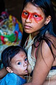 Ecuador, Tena, immersion life experience with the Waoranis of the Rio Nushino, breast-feeding