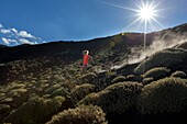 Italy, Sicily, Mount Etna Regional Nature Park, Mount Etna, UNESCO World Heritage Site, North Slope, woman practicing running