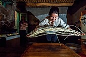 China, Xinjiang autonomous region, Kashgar, in a Uighur family's home, preparation of home made pasta