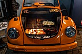 Poland, Voïvodie Lesser Poland, Krakow, Stare Miasto district, World Heritage Site, Old Town, Tytano, a former industrial complex converted into an outlet with bars and discotheque, Volkswagen Beetle transformed into a barbecue