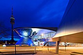 Germany, Bavaria, Munich, BMW Welt, showroom of the brand native from Munich opened in 2007 and realized by the architect firm Coop Himmelb(l)au and the Olympic tower or Olympiaturm