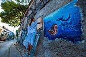 Colombia, Bolivar Department, Carthagena of the Indies, registered Wolrd Heritage by UNESCO, Getsemani neighborhood, mural frescoes, street art painter Iris Muller