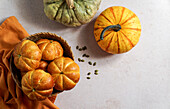Pumpkin roll yeast bread with spices on linen background. Thanksgiving food concept. Autumn concept,top view,Halloween