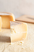 Detail of a piece of Italian cheese called Pecorino, front view
