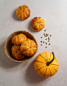 Pumpkin roll yeast bread with spices on linen background. Thanksgiving food concept. Autumn concept,top view,Halloween