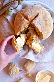 Traditional Australian damper bread with Wattleseed flavour,known for its thick,crispy exterior and dense,doughy interior