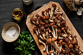 Poplar mushrooms on a wooden table