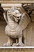 Telamons depicting grotesque figures or fantastic and allegorical animals, detail of the Baroque facade, Church of Santa Croce, Lecce, Salento, Puglia, Italy, Europe