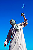 Arab protester throws stone during clashes, Florence, Tuscany, Italy, Europe