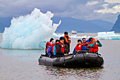 Guests from the Lindblad Expeditions ship National Geographic Sea Bird during Zodiac operations near LeConte Glacier in Southeast Alaska, United States of America, North America