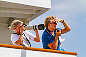 Guests aboard the Lindblad Expeditions ship National Geographic Explorer, South Atlantic Ocean