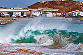 Huge waves breaking on the beach at Ascension Island in the Tropical Atlantic Ocean, South Atlantic Ocean