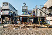 Village Underground Lisboa, an international platform for creativity, art, and culture, built with two buses and 14 shipping containers converted into creative spaces, Lisbon, Portugal, Europe