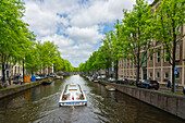 Touristenboot auf dem Herengracht-Kanal,Amsterdam,Niederlande,Europa