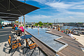 People on terrace on top of NEMO Science Museum, Amsterdam, The Netherlands