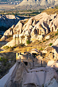 Cave dwellings in Pigeon Valley, Uchisar, Cappadocia, Anatolia, Turkey, Asia Minor, Asia