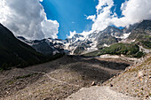 Hiking trail in alpine landscape facing Monte Rosa with moraine landscape, Italian Alps, Italy, Europe