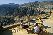 Women on a terrace above the Dana Valley, Jordan, Middle East