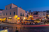 View of cafes and bars on Via Marina at dusk, Forio, Island of Ischia, Campania, Italy, Europe