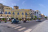 View of cafes and bars at the marina and Torrione Castle Museum, Forio, Island of Ischia, Campania, Italy, Europe