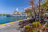 View of boats and bar in Porto d'Ischia (Port of Ischia), Island of Ischia, Campania, Italy, Europe