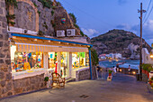 View of shops and town in Sant'Angelo at dusk, Sant'Angelo, Island of Ischia, Campania, Italy, Europe