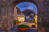 View of shops and town in Sant'Angelo at dusk, Sant'Angelo, Island of Ischia, Campania, Italy, Europe