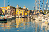 View of Church of Santa Maria della Pieta in the fishing port Marina Grande with boats, Procida, Phlegraean Islands, Gulf of Naples, Campania, Southern Italy, Italy, Europe