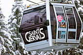 French Alps in winter, gondola lift at famous ski station, Saint Gervais Mont-Blanc village, Saint Gervais, Haute Savoie, France, Europe