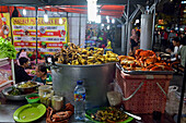 Open-air street side restaurant (lesehan) by night on Malioboro Street, major shopping street in Yogyakarta, Java island, Indonesia, Southeast Asia, Asia