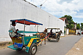 Dokar riding, horse-drawn cart, a typical Indonesian means of transport, Lasem, Java island, Indonesia, Southeast Asia, Asia