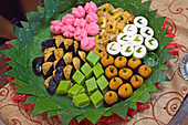 Close-up of plate of snacks, Pekalongan, Java island, Indonesia, Southeast Asia, Asia